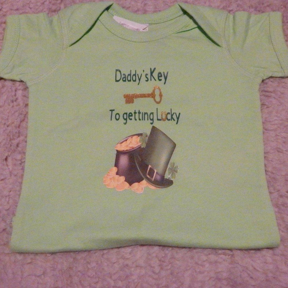 Custom made "daddy's key to getting lucky" onesie